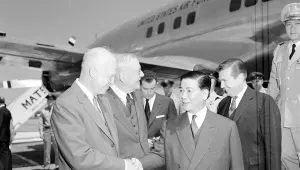 U.S. President Dwight D. Eisenhower and Secretary of State John Foster Dulles (from left) greet South Vietnamese President Ngo Dinh Diem at Washington National Airport