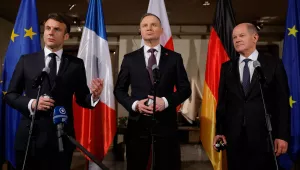 French President Emmanuel Macron, Polish President Andrzej Duda and German Chancellor Olaf Scholz make a statement after their meeting during the Munich Security Conference