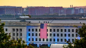 A U.S. flag is unfurled at the Pentagon 