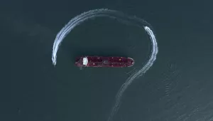 a speedboat of Iran's Revolutionary Guard moving around the British-flagged oil tanker Stena Impero