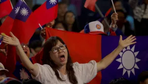 Supporters of Nationalist or KMT party cheer 
