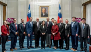 Taiwan's President Tsai Ing-wen, center, poses for photos with members of a visiting Congressional delegation 