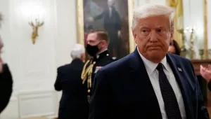 President Donald Trump departs after speaking about the PREVENTS "President's Roadmap to Empower Veterans and End a National Tragedy of Suicide," task force, in the East Room of the White House in Washington. The relationship between the nation's military community and the Republican president has been strained repeatedly over the course of Trump's turbulent first term.