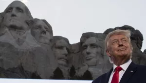 Donald Trump smiles at Mount Rushmore National Memorial