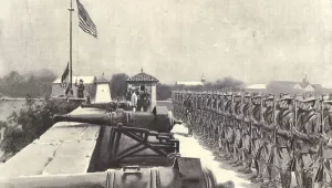 Raising the American flag over Fort Santiago, Manila