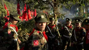In this Jan. 12, 2015 photo, officers with the Ta’ang National Liberation Army gather in the steep hillside jungles in Mar Wong, a village in northern Shan state, Myanmar. 