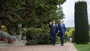 President Joe Biden and China's President President Xi Jinping walk in the gardens