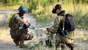 Ukrainian soldiers operate first-person view (FPV) drones to carry out improvised strikes during their efforts to defend against the ongoing Russian invasion.