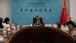 Fu Cong, center, the director general of the Foreign Ministry's arms control department, attends a press conference on nuclear arms control in Beijing, China, Tuesday, Jan. 4, 2022. 