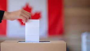 A Canadian casts a vote