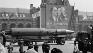 A naval rocket is exhibited in Moscow's Red Square past a banner of Vladimir Lenin, Friedrich Engels and Karl Marx during the annual May Day parade in the Soviet Union in May 1, 1963. 