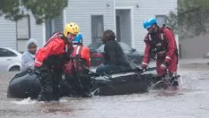 North Carolina emergency services evacuate residents of a neighborhood that fell victim to the flooding caused by Hurricane Matthew in Fayetteville, N.C., Oct 08, 2016. 