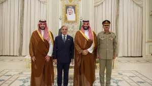 In this photo released by Pakistan's Press Information Department, Saudi Arabia's Crown Prince Mohammed bin Salman, second right, Saudi Arabia's Defence Minister Khalid bin Salman, left, Pakistan's Prime Minister Shehbaz Sharif, second left, and Pakistan's Army Chief Field Marshal Asim Munir, pose for photographs after signing a mutual defense pact, in Riyadh, Saudi Arabia, Wednesday, Sept. 17, 2025. (Press Information Department via AP)