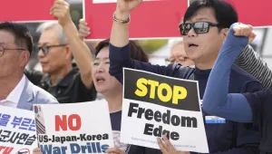 Protesters shout slogans during a press conference to oppose the military exercise called Freedom Edge in Seoul, South Korea, Monday, Sept. 15, 2025.