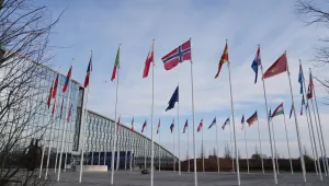 Flags flap in the wind outside NATO headquarters in Brussels, Monday, Jan. 19, 2026. (AP Photo/Virginia Mayo)