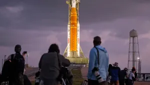 Photographers set up remote cameras near NASA's Artermis II moon rocket on Launch Pad 39-B just before sunrise at the Kennedy Space Center Tuesday, March 31, 2026, in Cape Canaveral, Fla. (AP Photo/Chris O'Meara)