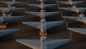 Low-cost Unmanned Combat Attack System (LUCAS) drones are positioned on the tarmac at a base in the U.S. Central Command (CENTCOM) operating area, Nov. 23. The LUCAS platforms are part of a one-way attack drone squadron CENTCOM recently deployed to the Middle East to strengthen regional security and deterrence.