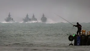 The Taiwanese Navy prepares for rapid reaction exercises with patrol boats at the mouth of the Tanshui river, Tuesday, Jan. 13, 2004, in the coastal town of Tainshui, northern Taiwan. 