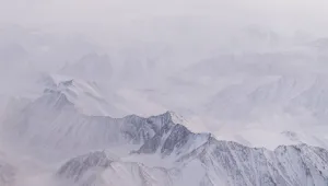 Snow covers the mountains of the Brooks Range in the Arctic National Wildlife Refuge, Oct. 14, 2024, near Kaktovik, Alaska.