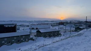 The city of Iqaluit, Nunavut, Canada, at sunset.