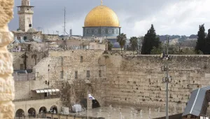 The Dome of the Rock Mosque in the Al Aqsa Mosque compound, and the Western Wall, the holiest site where Jews can pray, are seen in Jerusalem's Old City; Friday, April 10, 2020; (AP Photo/Sebastian Scheiner)