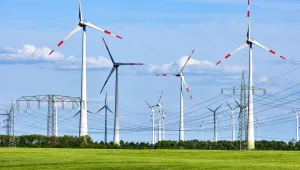 Wind power plants and overhead power lines seen in Germany