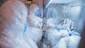 This undated photo released in 2019 by the Irkutsk Anti-Plague Research Institute of Siberia and Far East, shows the institute workers in a lab. (The Irkutsk Anti-Plague Research Institute of Siberia and Far East via AP) ADDITION: adding photo was released in 2019