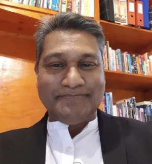 Man smiling facing camera 