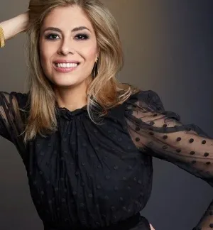 Headshot of Carla Dirlikov Canales