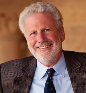 Headshot of Philip Taubman