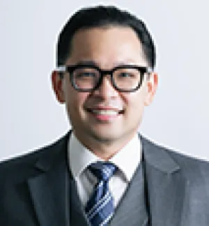 Headshot of Evan Laksmana 