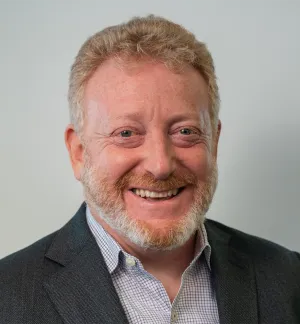 Headshot of Mark Brownstein.