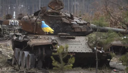 A destroyed Russian tank with an artwork depicting a dove with an olive branch by famous street artist TvBoy, amid Russia's attack on Ukraine, in the village of Dmytrivka, outside Kyiv, Ukraine Monday, Jan. 30, 2023.