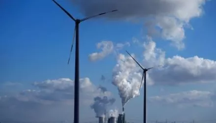 coal-fired power plant operates near wind turbines