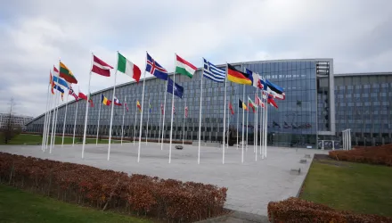 Flags flap in the wind outside of NATO headquarters in Brussels, Wednesday, Dec. 3, 2025. (AP Photo/Virginia Mayo)