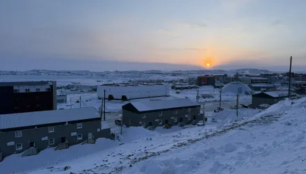 The city of Iqaluit, Nunavut, Canada, at sunset.