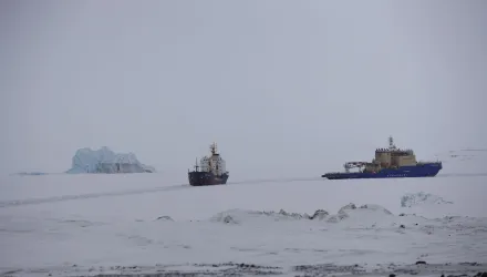 An icebreaker makes a path for a cargo ship near Nagurskoye, Russia, May 17, 2021.