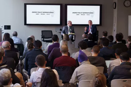 Joseph Aldy and Ben Harris speak to a Harvard Kennedy School audience.