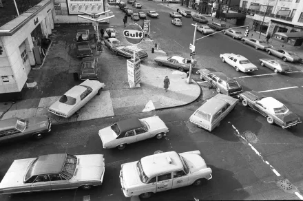Cars line up at gas station