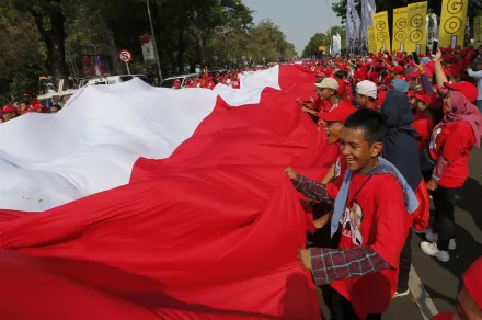 Indonesian Flag held by supporters at Jokowi Inauguration, 2019