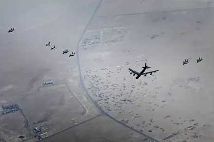 This photo released by the U.S. Air Force shows a B-52H Stratofortress assigned to the 5th Bomb Wing, Minot Air Force Base, North Dakota, flying over the Middle East on Sunday, Sept. 4, 2022. The United States military said Monday it flew a pair of nuclear-capable B-52 long-distance bombers over the Middle East in a show of force, the latest such mission in the region as tensions remain high between Washington and Tehran.