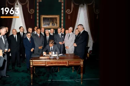 The United States, the Soviet Union, and the United Kingdom sign the Limited Test Ban Treaty..jpg