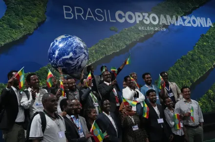 Delegates from Ethiopia, host of COP32, pose for a photo at the COP30 