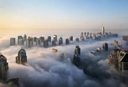 In this Monday, Oct 5, 2015 photo, a thick blanket of early morning fog partially shrouds the skyscrapers of the Marina and Jumeirah Lake Towers districts of Dubai, United Arab Emirates.