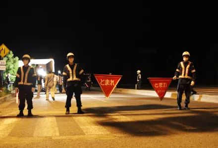 Law enforcement checkpoint on National Highway 6, restricted area, Naraha Town, Fukushima Prefecture.