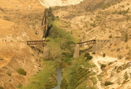 An Ottoman era bridge, once used for the Hijaz railway across the Yarmouk River on the border of Southern Syria and Northern Jordan, lies in disrepair since it was bombed by British forces in 1946.