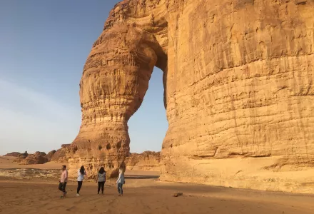 HKS students admire Elephant Rock in the desert near Al Ula, Saudi Arabia