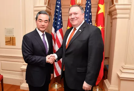 Secretary Pompeo Shakes Hands With Chinese State Councilor and Foreign Minister Wang Yi
