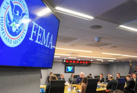 Several officials meet at FEMA's National Response Coordination Center to discuss the ongoing fight against the coronavirus. 