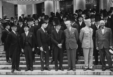 Secretary of State George C. Marshall (3rd from right) talks with Harvard President James Bryant Conant on the steps of Widener Library during Commencement in June 1947.  Marshall had announced the Marshall Plan that day in Harvard Yard.